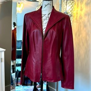 NWT Cole Haan Red leather jacket. Never worn perfect condition.